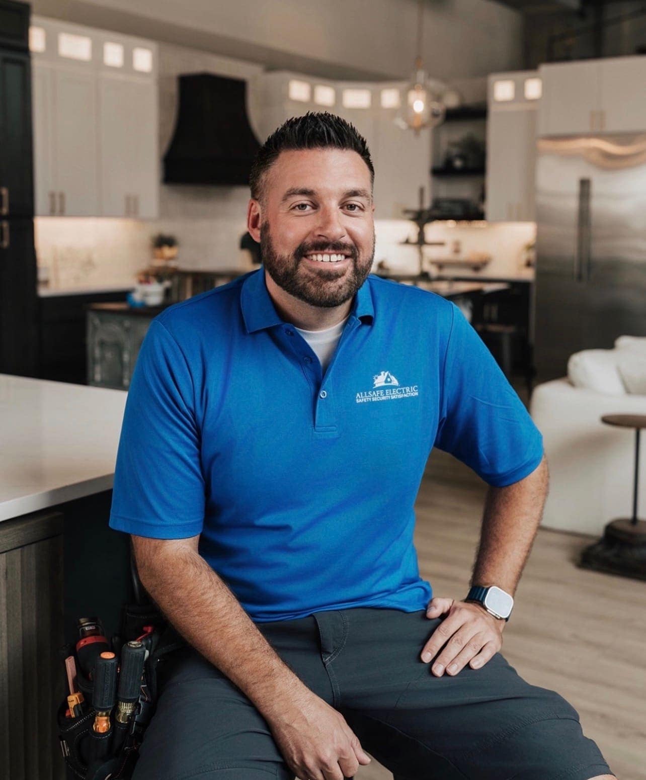 Jud Cushing, owner and master electrician at Allsafe Electric, in a Parker kitchen