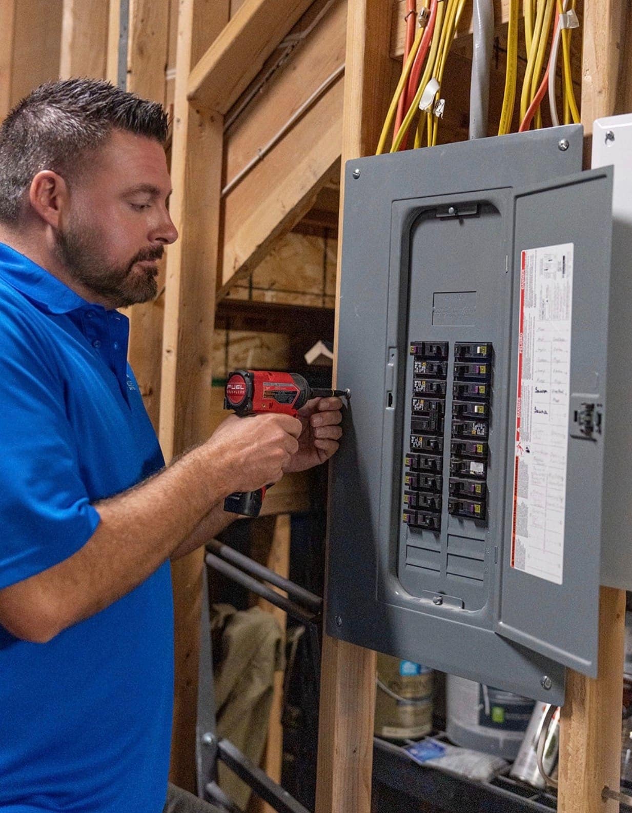 Refitting the deadfront cover on a finished breaker panel