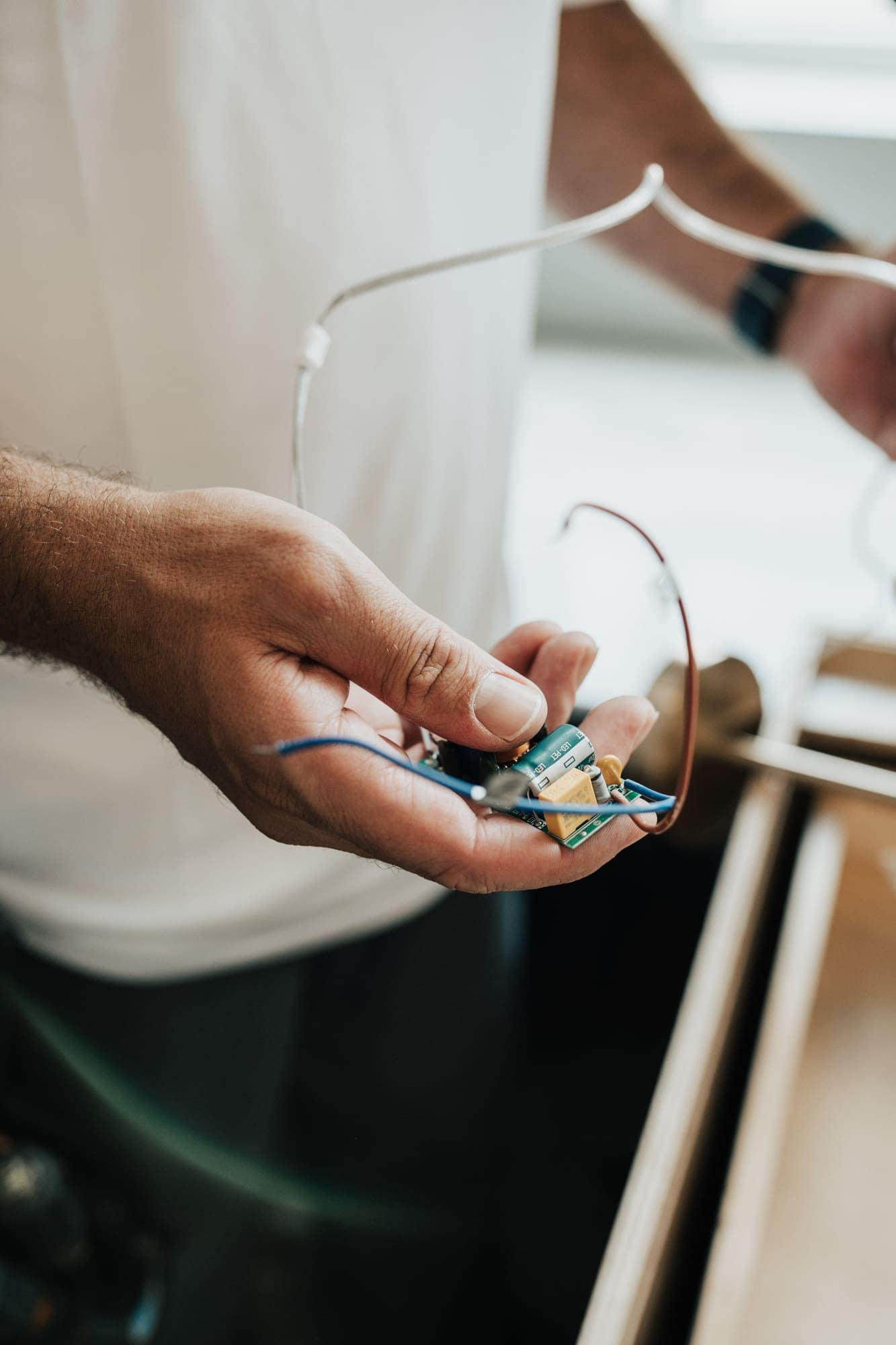 Repairing the wiring connections behind a ceiling light fixture