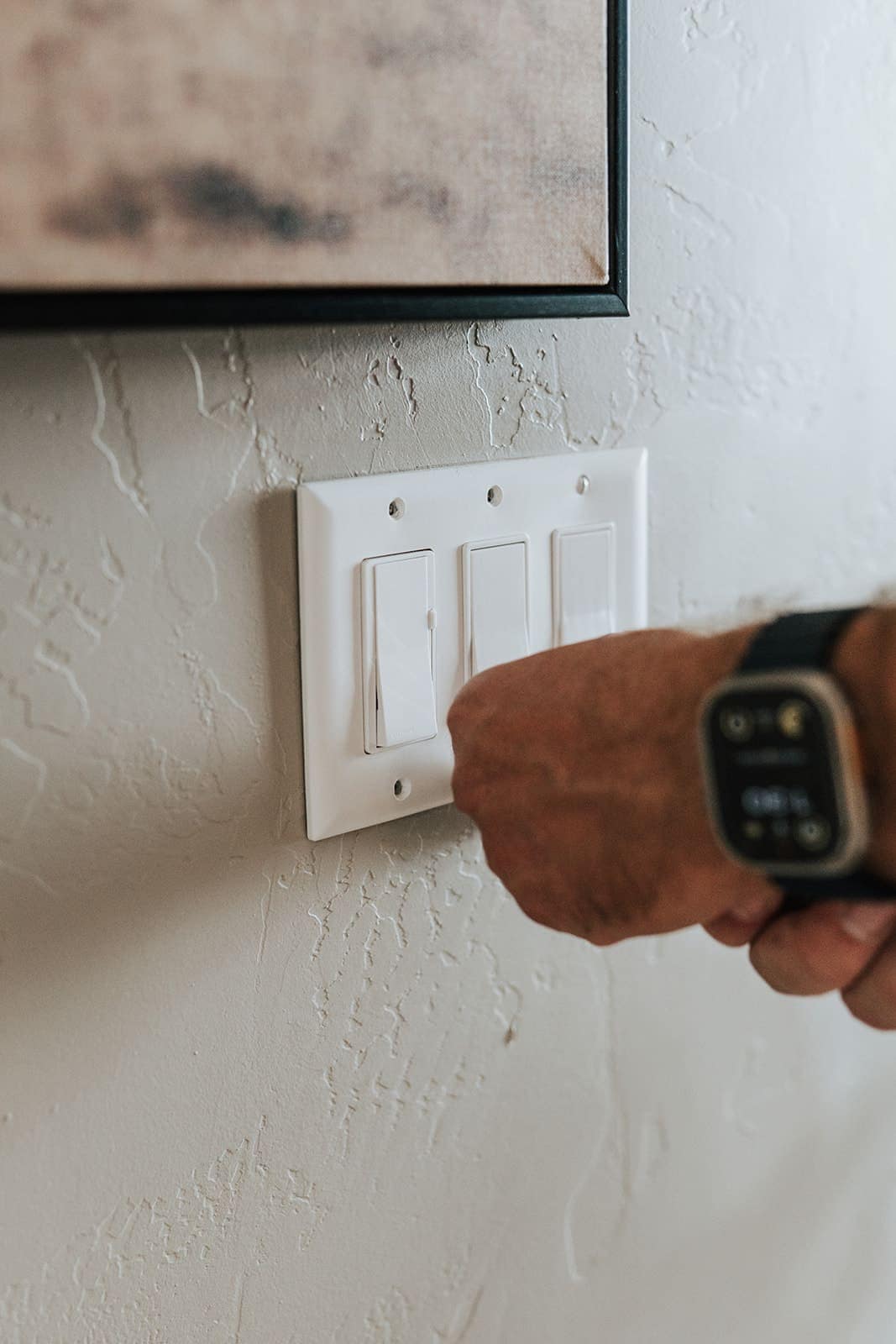 Testing a bank of three light switches to isolate a dead circuit