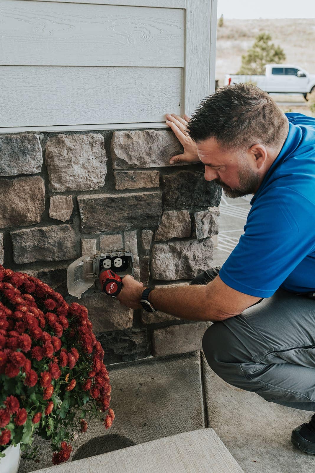 Outdoor outlet work on a stone wall